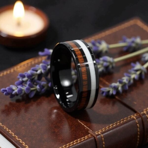 Black tungsten ring for men with inlays of wood and antler for a unique mens fashion statement ring.