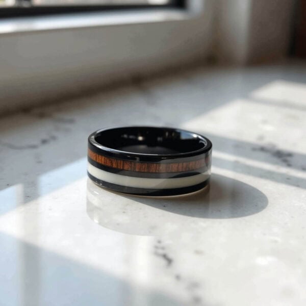 A magnificent mens tungsten ring - a black band with wood and antler inlays