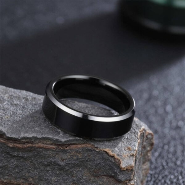 Black tungsten mens ring with polished silver edges