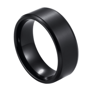 A zoomed in image showing a ring in close up detail. The ring is made with titanium and is all black. It has a slightly raised brushed centre and stepped polished edges.