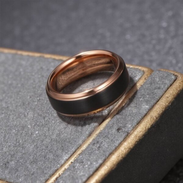 Rose gold and black tungsten ring with optional custom ring engraving.