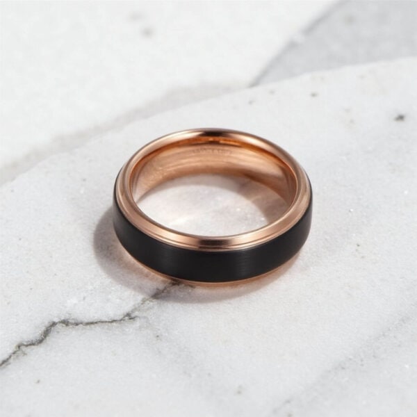Tungsten ring for guys. Distinctive black and rose gold engagement ring for him.