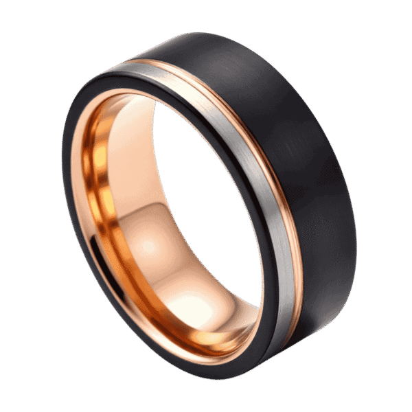 A three tone tungsten ring in close up. The main section of the ring is brushed black. It features a thin groove of rose gold and a section of brushed silver. An innovative wedding ring for men.