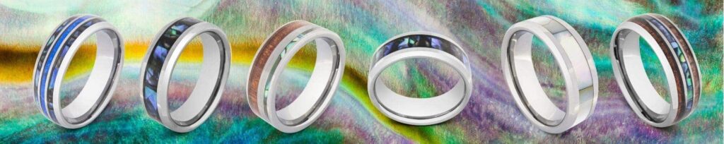 Selection of rings designed for men featuring abalone shell