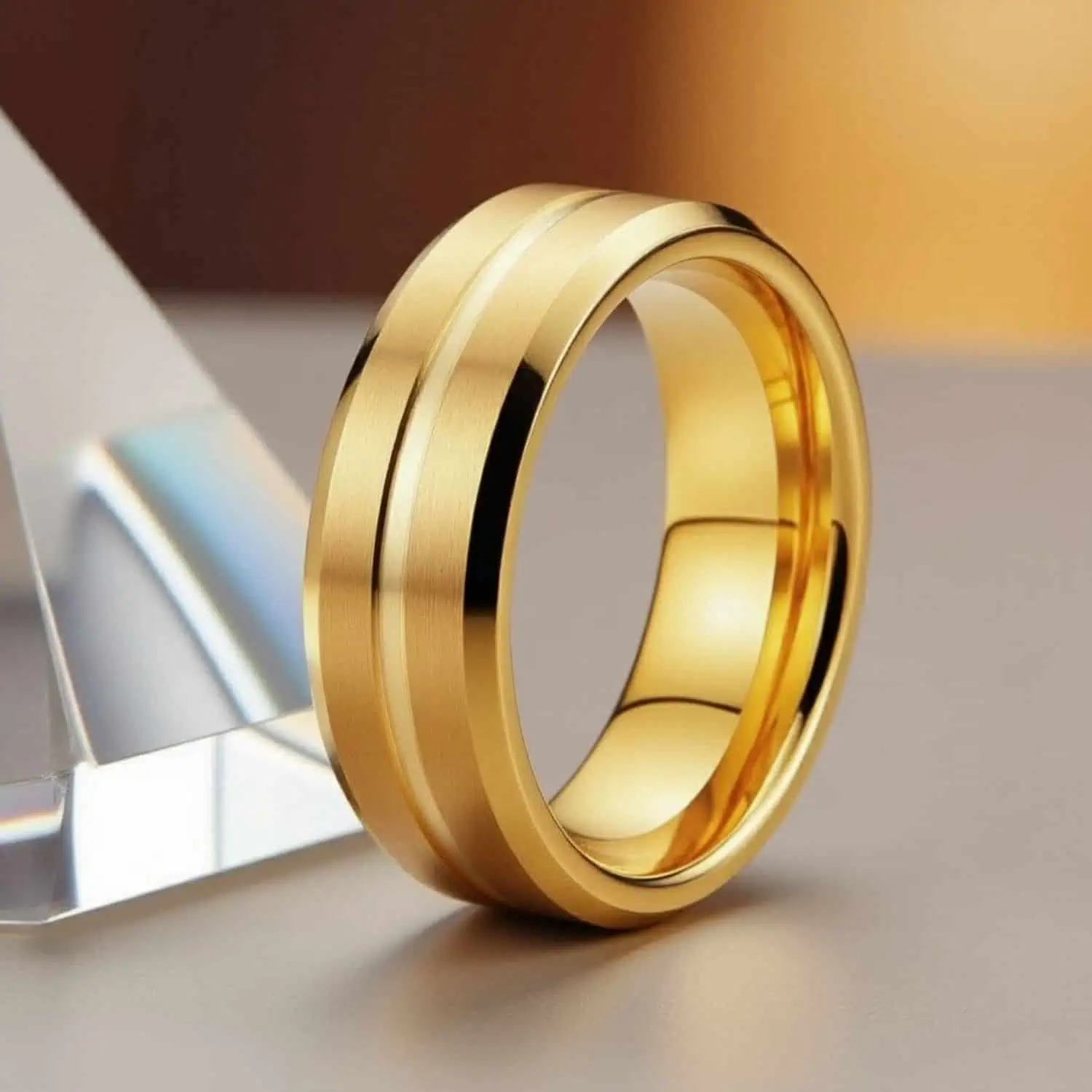 Brushed and polished gold titanium ring for men, refined wedding or eternity band with engraving.