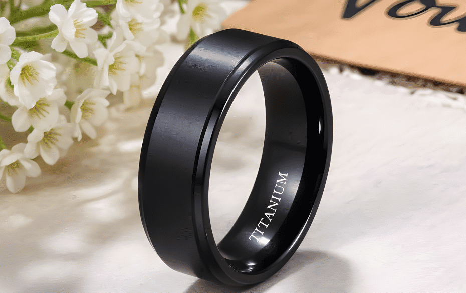 Black titanium wedding band with a sleek matte finish, perfect for modern couples seeking durable and stylish wedding rings.