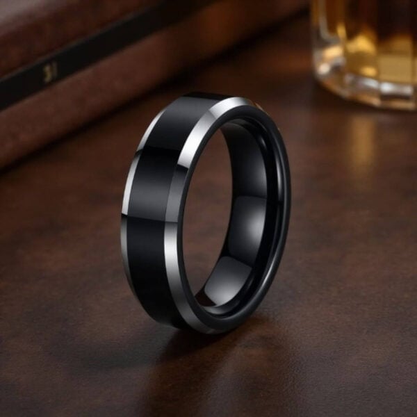 This titanium ring, with its blend of black and silver is perfectly suited as a gents wedding band, or an eternity ring for him