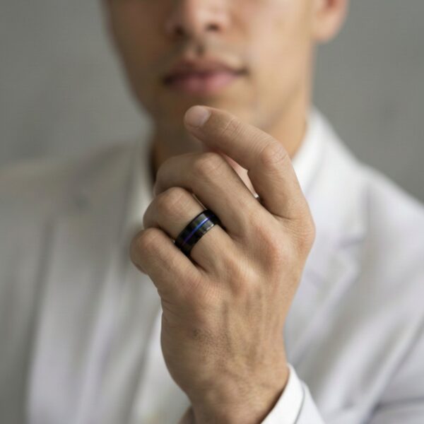 Black titanium ring for men with iridescent groove – mens wedding band with personalised custom engraving