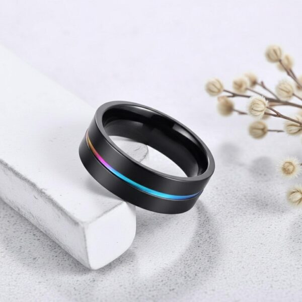 Mens iridescent black titanium ring – statement wedding band with personalised custom engraving.
