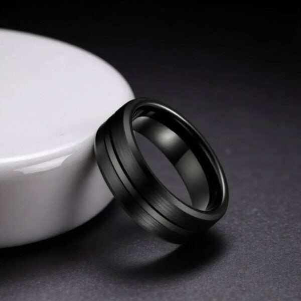 An elegant mens tungsten wedding band - all black ring for men