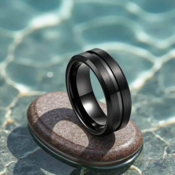 Crafted with tungsten, a black band suited as a male fashion statement ring
