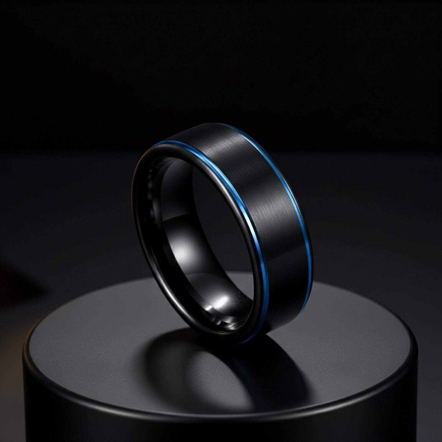 black tungsten ring for men with blue sides – male fashion statement and wedding band.