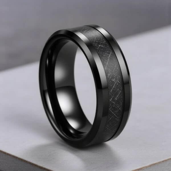 Gents black tungsten ring featuring faux meteorite inlay. Custom ring engraving available.