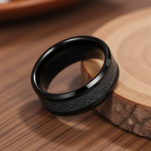 Faux meteorite set within black tungsten ring for men.