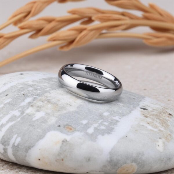 Lightweight titanium mans wedding band or promise ring. Custom ring engraving.