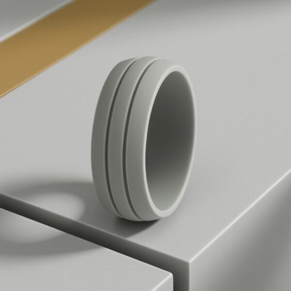 Contemporary light grey silicone ring for men with double grooves. Wear as a male engagement ring, gents eternity ring, or versatile flexible band.