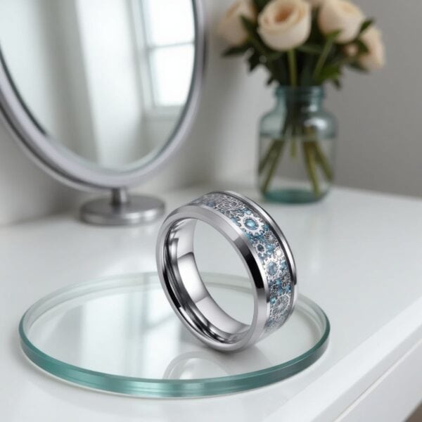 Carbon fibre man’s ring with cogwheel design in a silver tungsten band, suitable as a male wedding band.