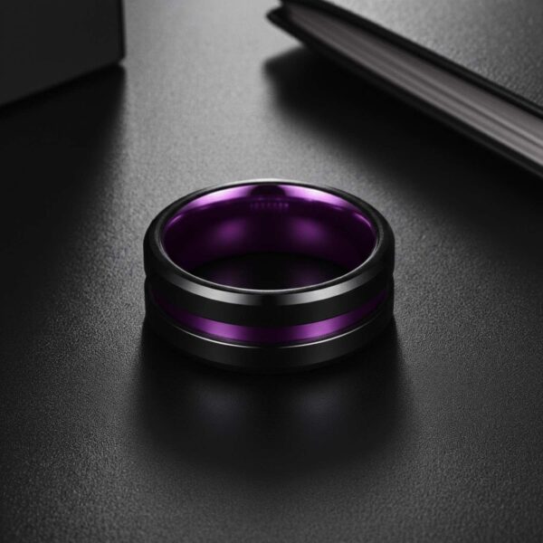 Purple and black men’s tungsten ring featuring a matte black exterior and vivid purple inner band.