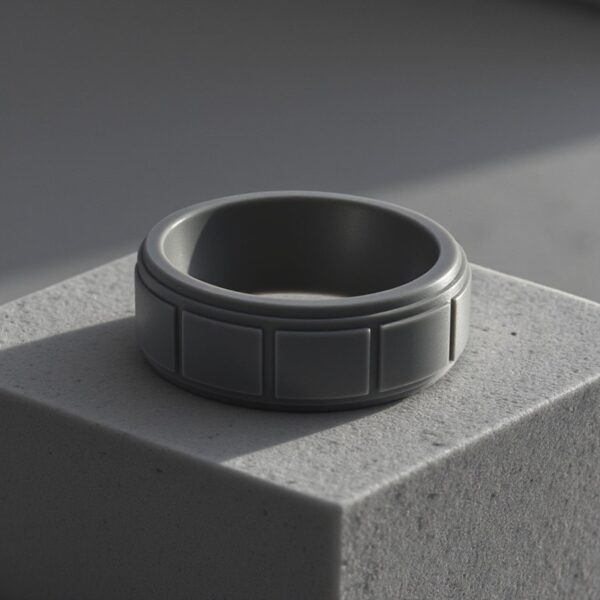 Durable charcoal grey silicone band for men with block pattern. A versatile male wedding band, gents eternity ring, or meaningful promise ring for him.