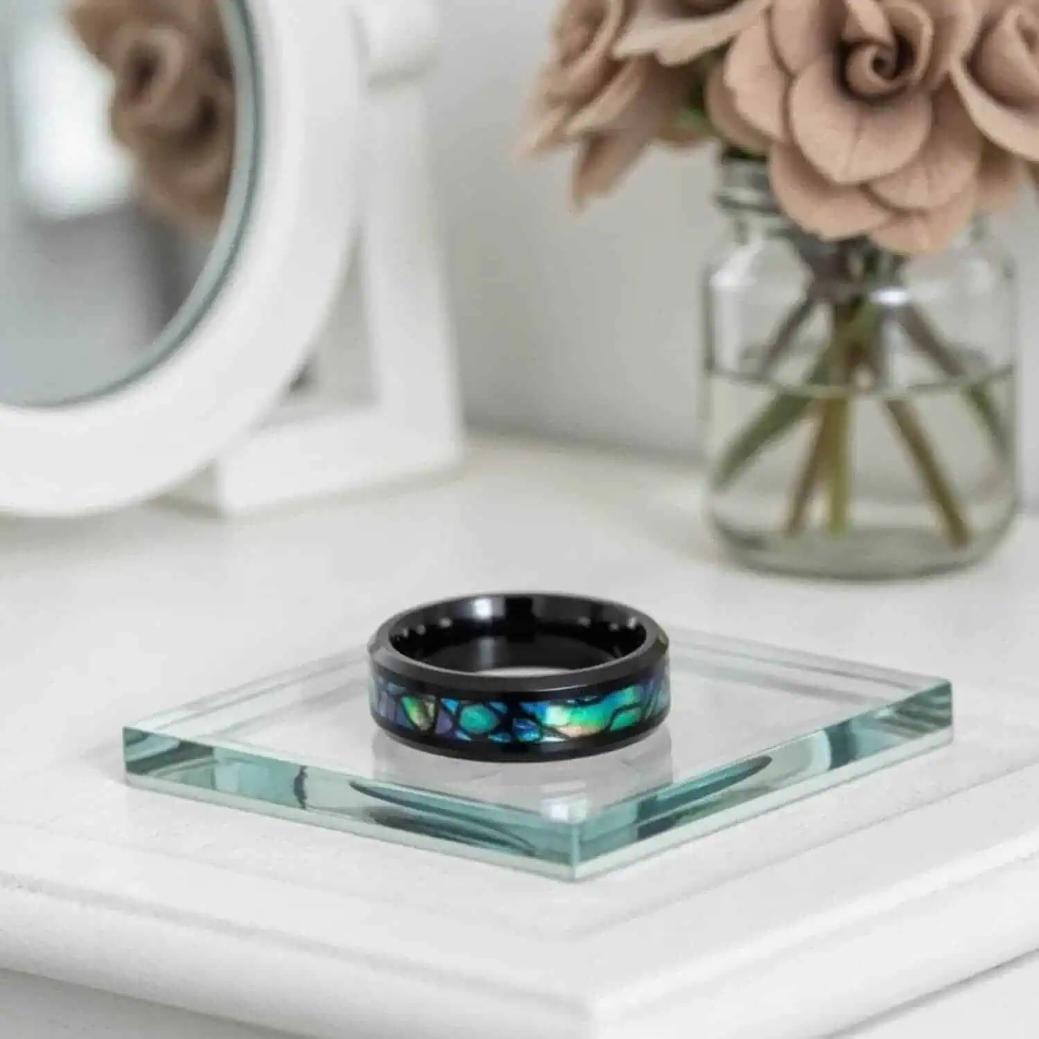 Men's black titanium ring with abalone shell inlay