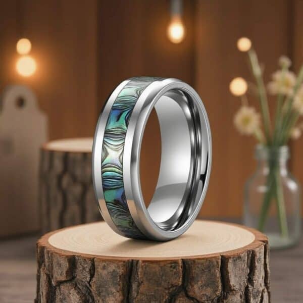 Silver and abalone shell men’s titanium ring — elegant, durable, and perfect as a wedding band or gift.