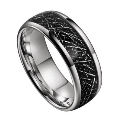 Close-up of an 8mm men's polished silver tungsten ring featuring a black faux meteorite inlay through the centre, isolated on a transparent background.