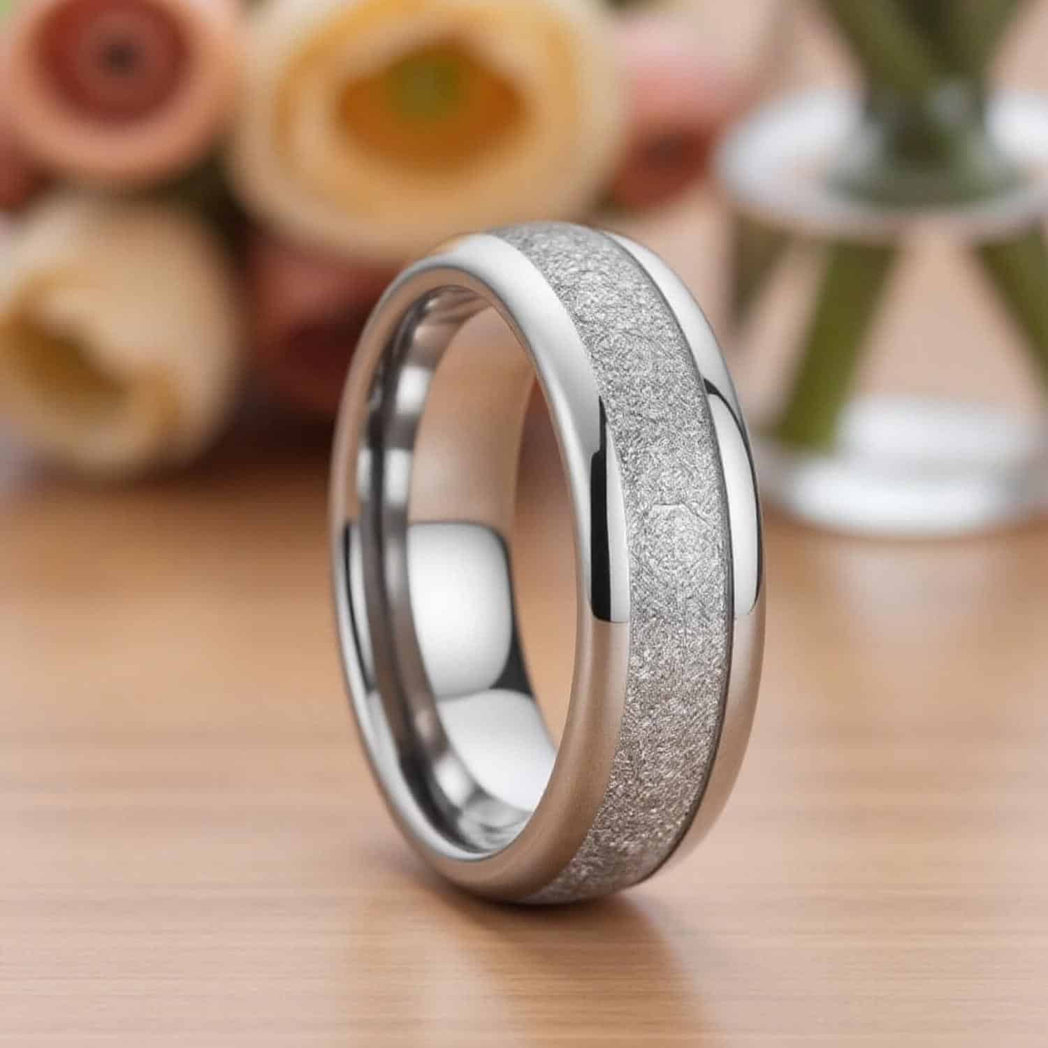 Tungsten menโs statement ring with meteorite inlay and custom engraving โ durable, stylish, and perfect for weddings or special occasions.
