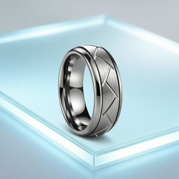 The Valiant silver tungsten fashion ring for men — brushed centre and polished grooves.
