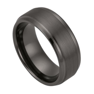 A zoomed in shot of a mens gunmetal grey tungsten ring. With a slightly raised centre section which has a brushed finish. And polished stepped edges.
