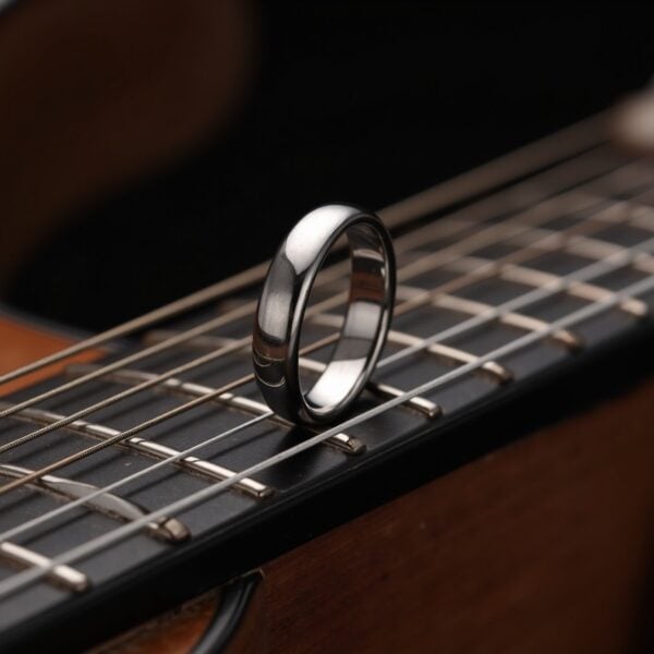 4 mm polished silver tungsten ring for men, slim wedding band or statement fashion ring for gents and guys.