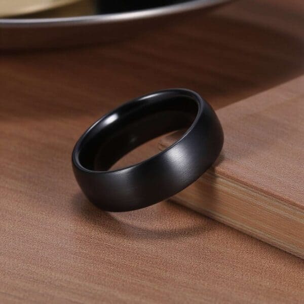 The Panther black ceramic men’s promise ring — brushed domed band with custom engraving for gents.