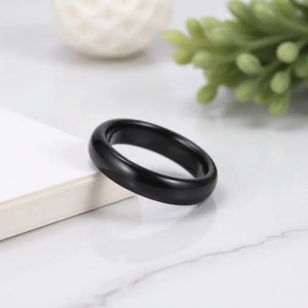 Black ceramic men’s ring — The Mountaineer elegant eternity band for him with personalised engraving.