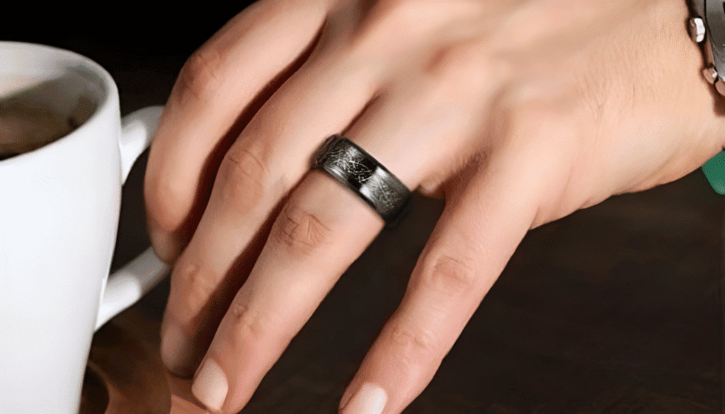 Fireball men’s black tungsten ring featuring a meteorite-inspired inlay, combining sleek design with rugged, celestial detail for a bold modern look.