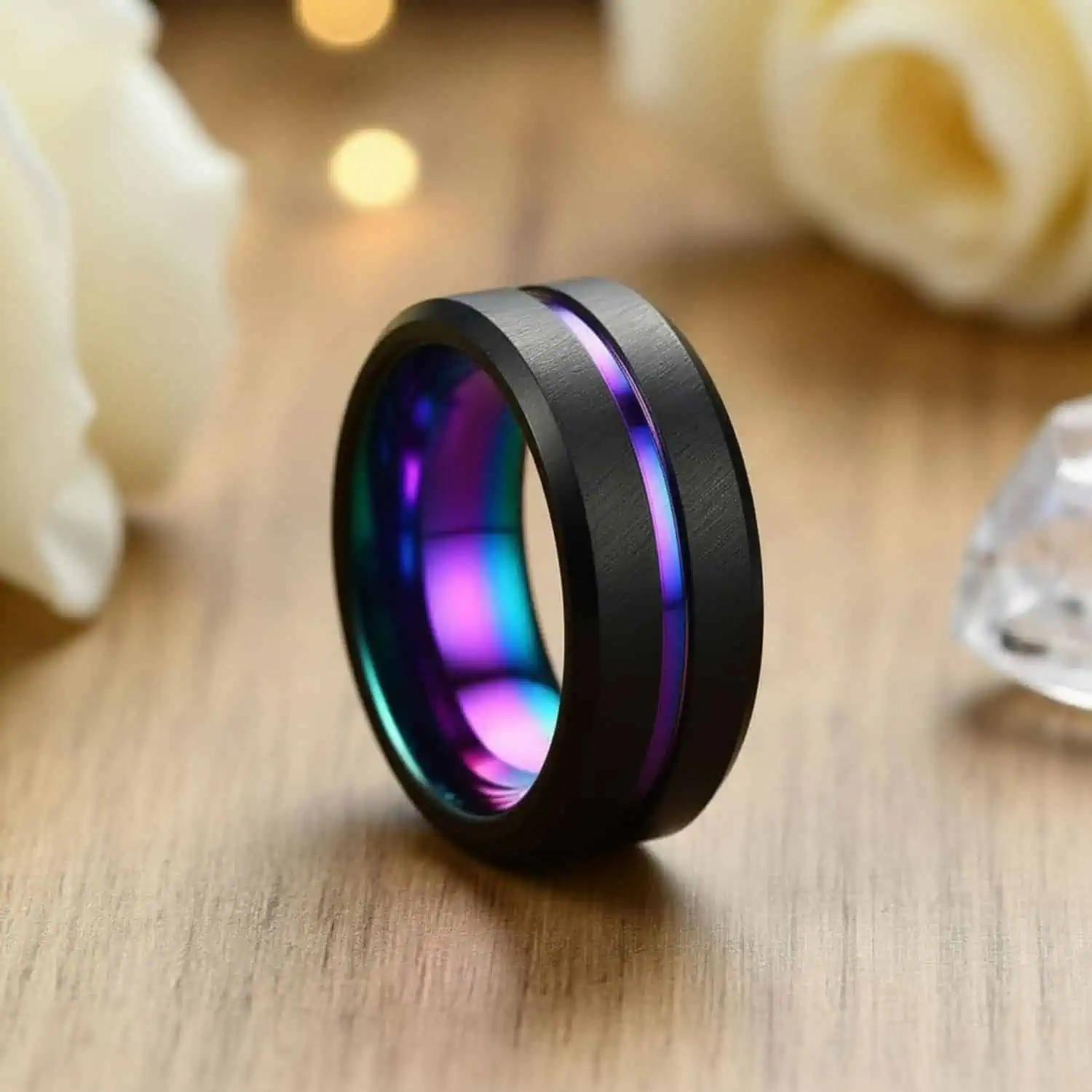 Black iridescent Unity tungsten ring for men — rainbow groove wedding band or eternity ring with engraving option.