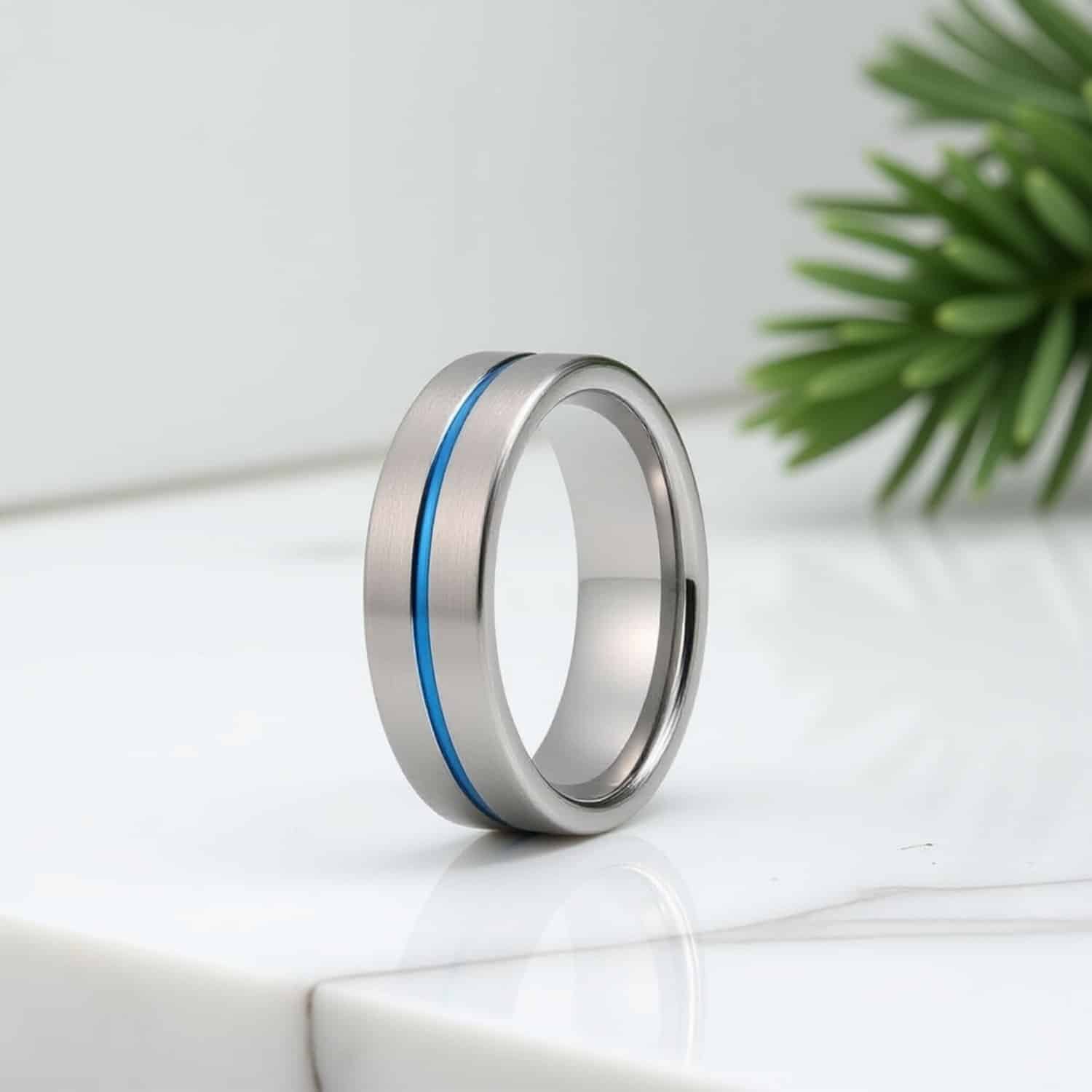 Negotiator tungsten men’s brushed silver ring with polished blue groove — modern, flat-profile design for weddings or special occasions.