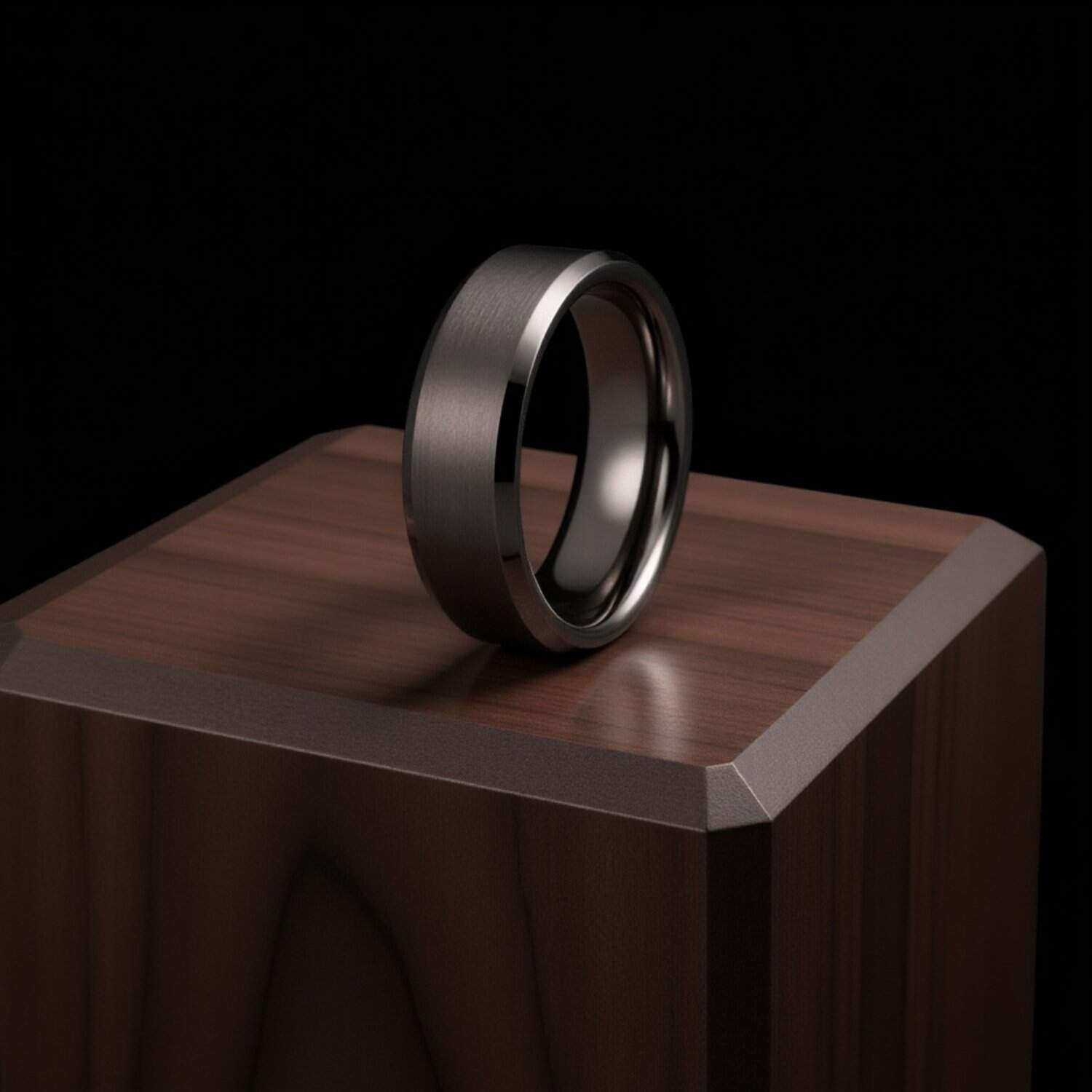 Driven menโs gunmetal grey tungsten wedding band with brushed finish, polished edges, and custom ring engraving for him.