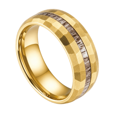 Close-up of the Splendour hammered gold tungsten carbide ring with a natural antler inlay through the centre, showing its textured 8mm design.