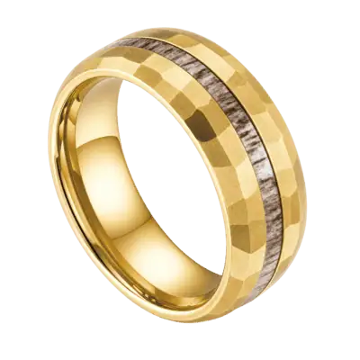 Close-up of the Splendour hammered gold tungsten carbide ring with a natural antler inlay through the centre, showing its textured 8mm design.