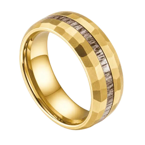Close-up of the Splendour hammered gold tungsten carbide ring with a natural antler inlay through the centre, showing its textured 8mm design.