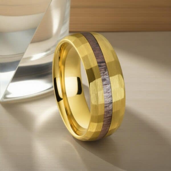 The Splendour men’s gold hammered tungsten and antler statement wedding ring.
