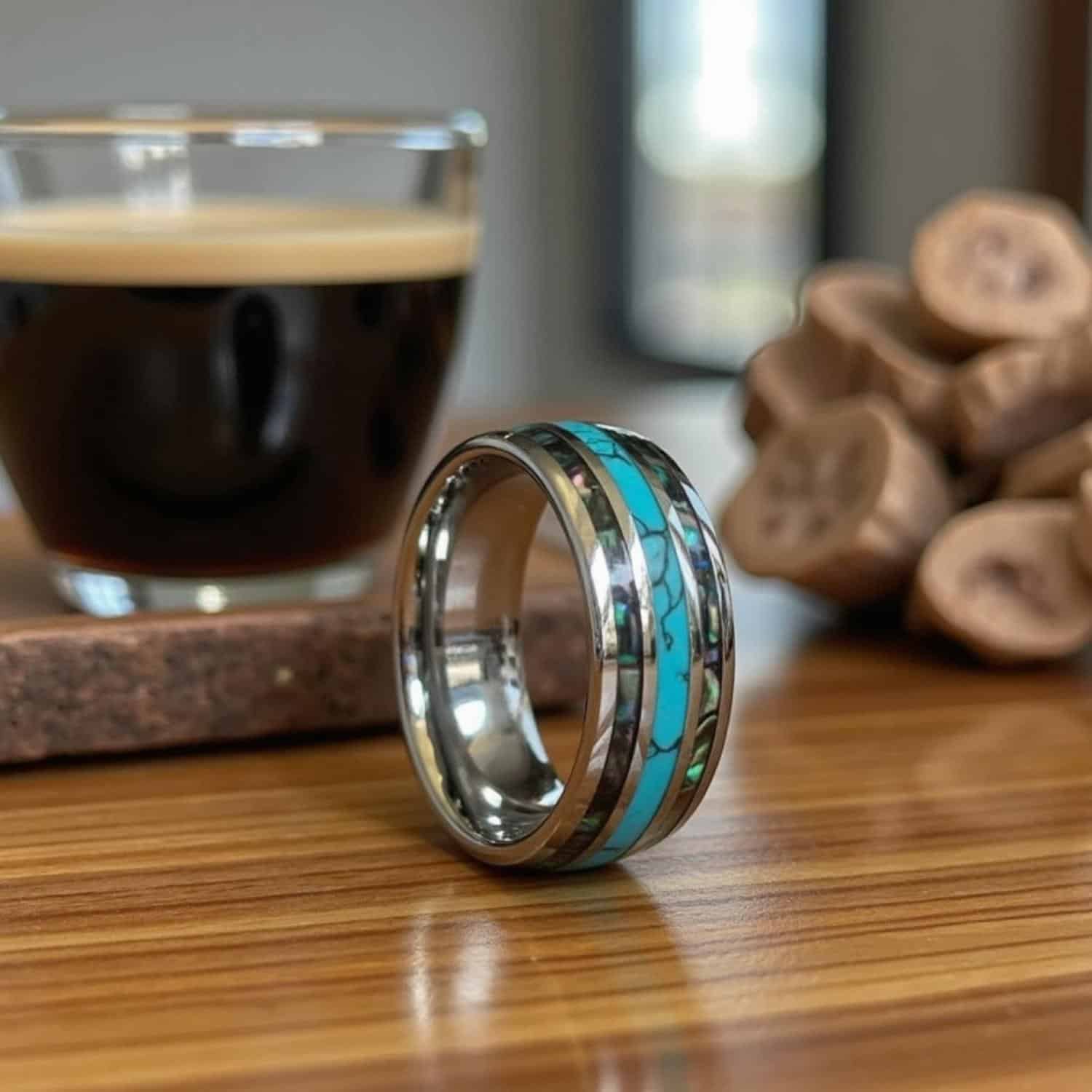 Abalone shell tungsten men’s ring with turquoise centre and engraving, ideal for weddings or anniversaries.