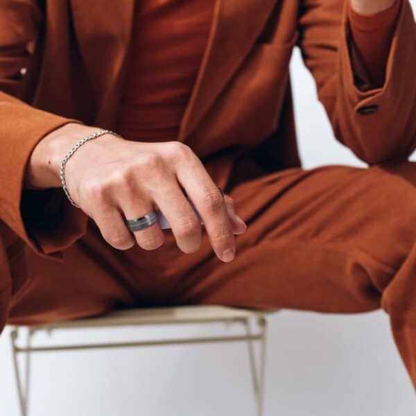 Man wearing mens wedding ring or engagement ring for men