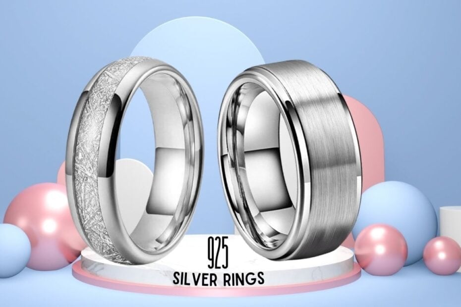 Shiny silver wedding bands displayed on a decorative platform with pastel coloured spheres and geometric shapes, showcasing high-quality wedding and engagement rings.