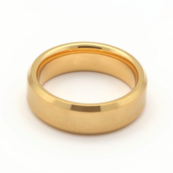 An impressive mens tungsten gold ring. Both elegant and superstrong. Well suited as a mans wedding ring, engagement ring or as a male eternity ring. Custom ring engraving available.