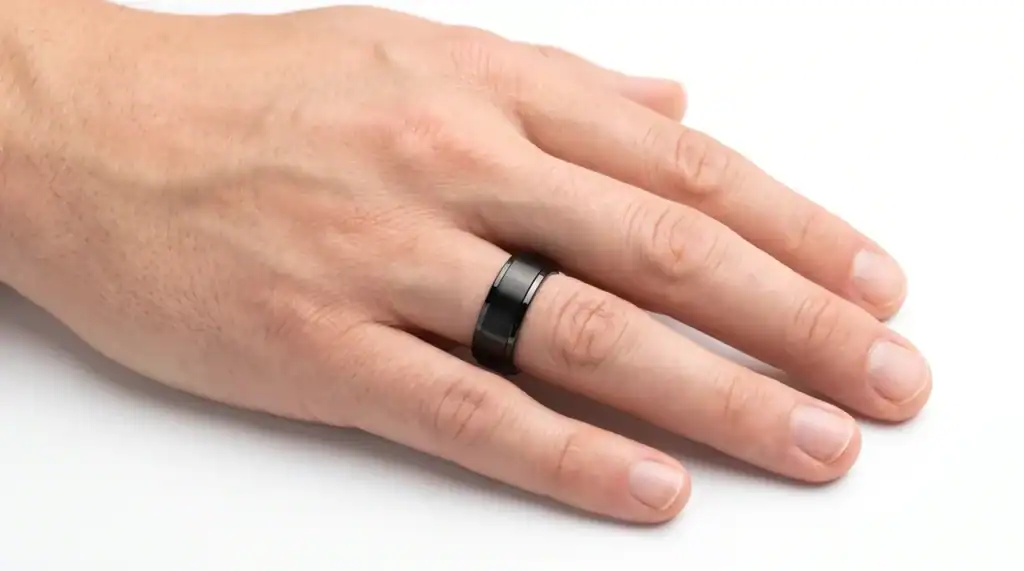 The Esteem black ceramic ring worn on the ring finger