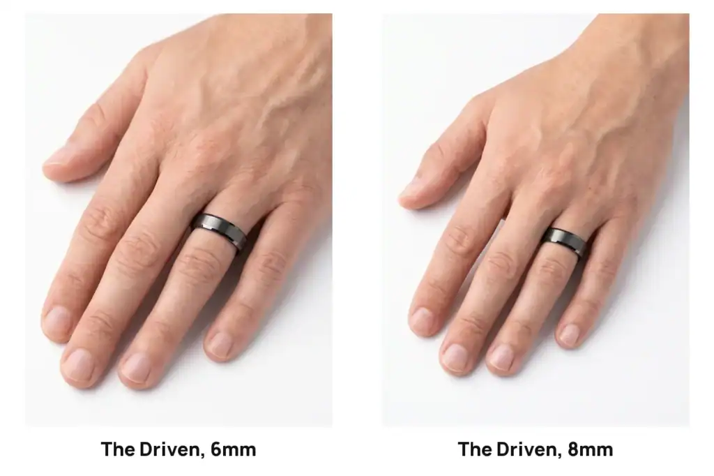 The Driven gunmetal grey tungsten ring in 6mm and in 8mm, each worn on the ring finger of a hand against a white studio background