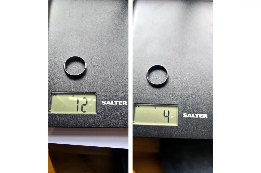 The Pursuit tungsten ring reading 12 g and the Esteem ceramic ring reading 4 g on kitchen scales, both 6mm, size U