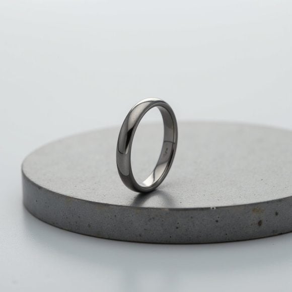 Polished slim 4 mm silver tungsten ring for men, elegant wedding band or anniversary eternity ring for him.