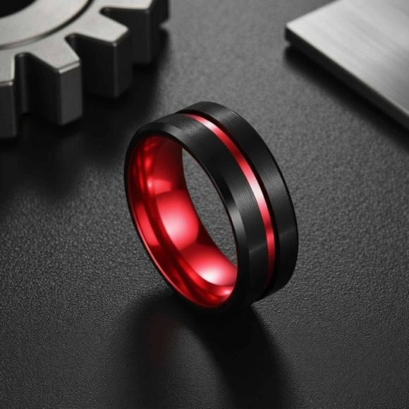 Mens black and red tungsten wedding band with brushed finish, elegant two-tone male ring with engraving.