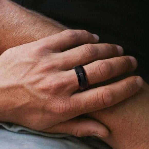 Man wearing black tungsten ring. Perfect for wedding or anniversary